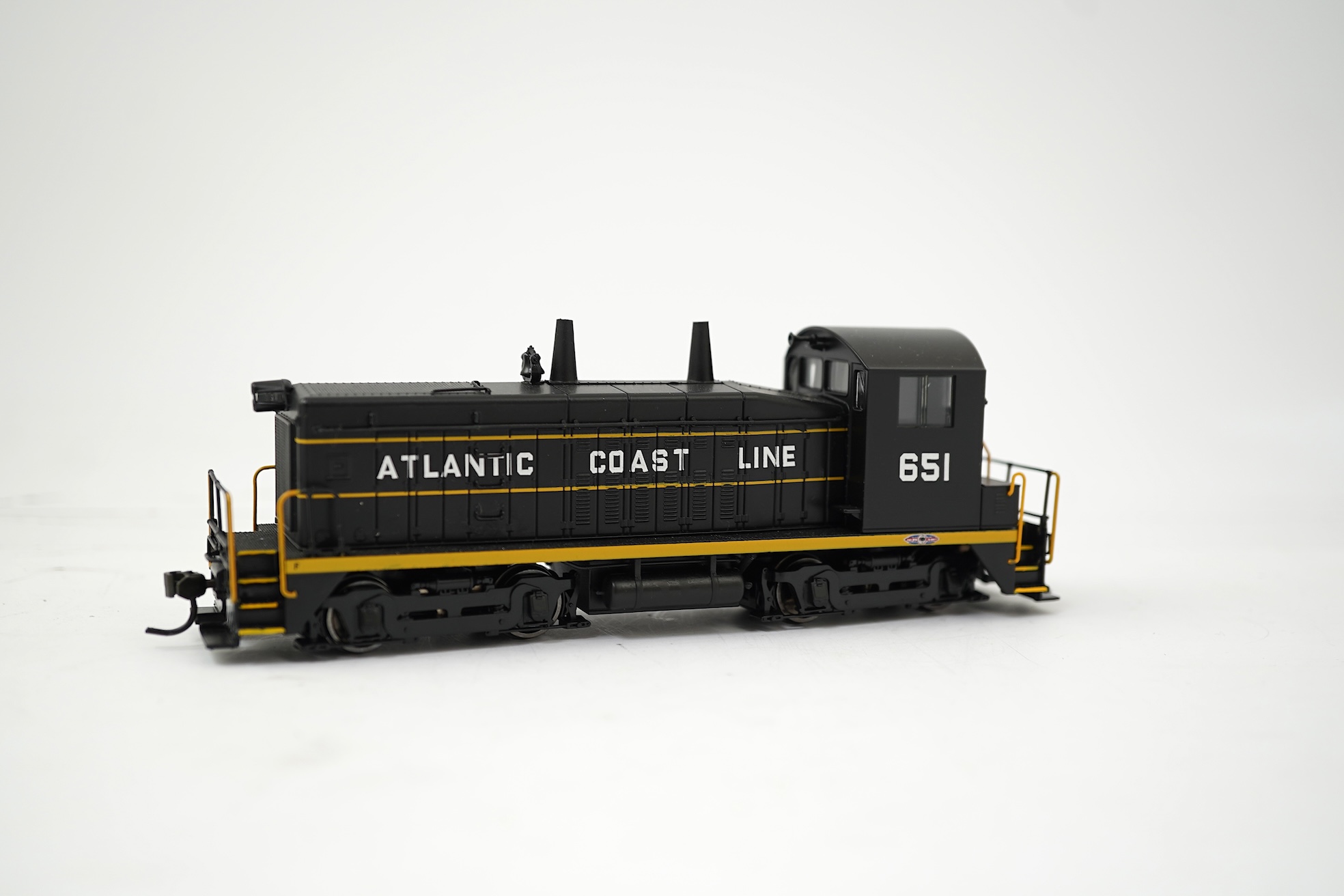 A boxed HO gauge Broadway Limited Paragon 2 Series (1215) model of Atlantic Coast Line, EMD SW7 Switcher PHII, 651, Bo-Bo diesel locomotive, powered for two rail operation.